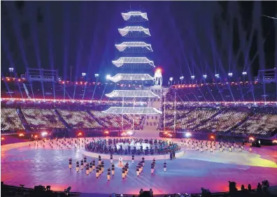  ?? CHRIS CARLSON/ASSOCIATED PRESS ?? Performers dance during Sunday’s closing ceremony of the 2018 Winter Olympics in PyeongChan­g, South Korea.