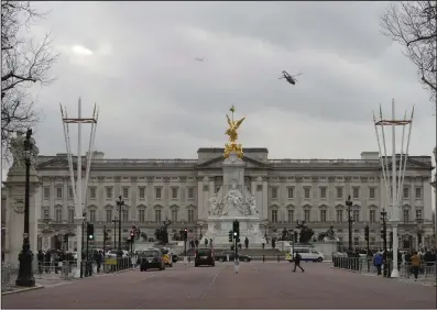  ?? (AP/Frank Augstein) ?? A helicopter believed to be carrying King Charles III and Queen Camilla leaves Buckingham Palace in London on Tuesday.