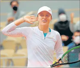  ??  ?? (Left) Poland’s Iga Swiatek celebrates after winning her semi-final against Argentina’s Nadia Podoroska. (Right) Sofia Kenin clenches her fist after beating Petra Kvitova in the other semi-final.