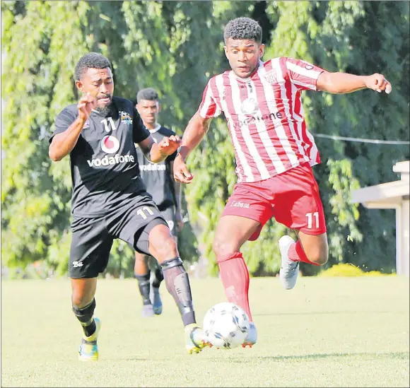  ??  ?? Ilisoni Lolaivalu on attack for Labasa against Ba during their clash at Fiji Football Academy in Ba. Picture: SUPPLIED