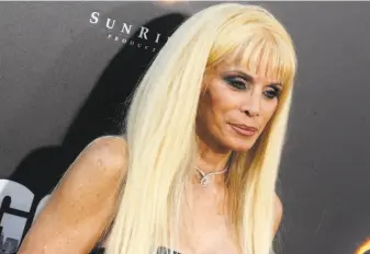  ?? Dennis Van Tine / Abaca Press ?? Victoria Gotti wrote the screenplay for “Victoria Gotti: My Father’s Daughter,” recounting her life as the child of the late mob boss John Gotti. The movie debuts Saturday, Feb. 9, on Lifetime.