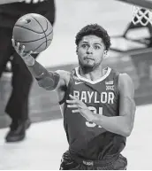  ?? Charlie Neibergall / Associated Press ?? Baylor’s Macio Teague has 1,500 career points, 500 rebounds, 250 assists, 125 steals and 250 made 3s.