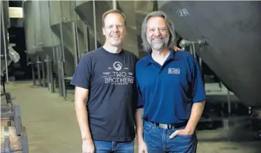  ?? ERIN HOOLEY / CHICAGO TRIBUNE PHOTOS ?? Jason, left, and Jim Ebel at Two Brothers Brewing on April 19 in Warrenvill­e.