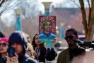  ?? Photograph: Erik S Lesser/EPA ?? A person holds an illustrati­on of the slain environmen­tal activist at a news conference in February.