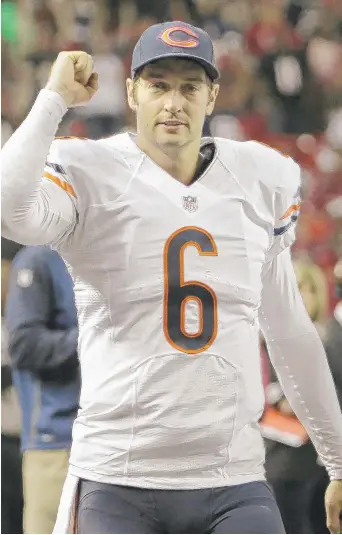  ?? | AP ?? Cutler celebrates a Bears intercepti­on late in the fourth quarter that sealed their victory against the Falcons.