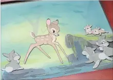  ?? ALEXANDER ARCHBOLD THE CANADIAN PRESS ?? An animation cel from “Bambi” sold for thousands of dollars after a homeless man sold it for $20. Adam originally found it in a dumpster.