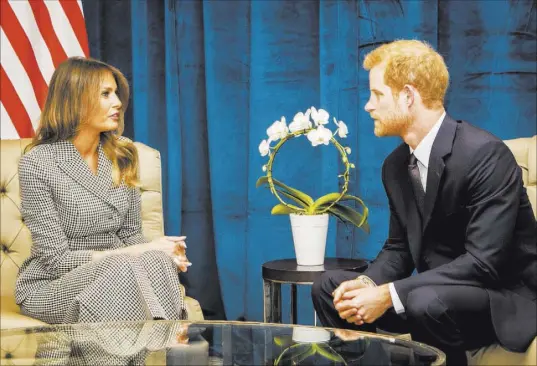  ?? Danny Lawson The Associated Press ?? Britain’s Prince Harry meets with first lady Melania Trump on Saturday ahead of the start of the Invictus Games in Toronto.