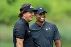  ??  ?? Woods and Mickelson are damned good friends according to Steve Loy (Getty)