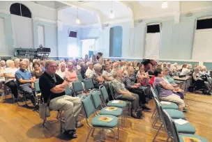  ??  ?? The audience at Bilston Town Hall waiting patiently for the film to start