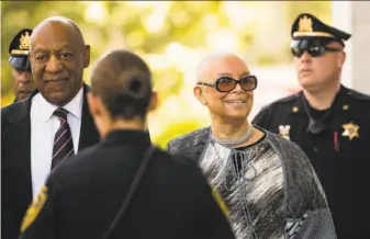  ?? Matt Rourke / Associated Press ?? Bill Cosby arrives for trial with his wife, Camille, at the Montgomery County Courthouse in Norristown, Pa. He is charged with three counts of aggravated indecent assault.