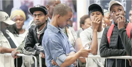  ??  ?? THE shopping frenzy will continue tomorrow albeit without the queues in stores. On Friday, bargain hunters were out in force to cash in on discounted goods.