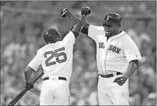  ?? CHARLES KRUPA/AP PHOTO ?? Red Sox designated hitter David Ortiz, right, celebrates with Jackie Bradley Jr. after his three-run homer in the third inning of Tuesday’s game against the Tigers at Fenway Park. The Red Sox lost, 9-8.