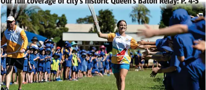  ?? Photo: Kevin Farmer ?? GETTING INTO THE SPIRIT: Local BMX star Carissa Osborne starts the Queen’s Baton Relay in Toowoomba at Wilsonton State School. The city counted 76 baton bearers during the mammoth relay yesterday.