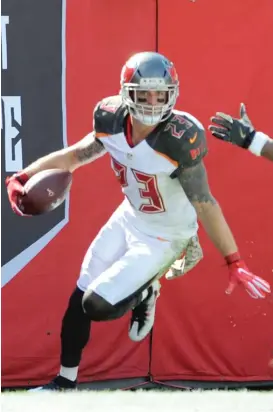  ??  ?? Buccaneers coach Dirk Koetter says former Bears safety Chris Conte’s pick- six of Jay Cutler last year turned the Bucs’ season around.
| STEVE NESIUS/ AP