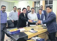  ?? HT PHOTO ?? Meghalaya cricket officials with chief minister Conrad Sangma after signing MoU for the T20 league.