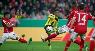  ?? — Reuters ?? Dortmund’s Ousmane Dembele scores the match-winning goal against Bayern.
