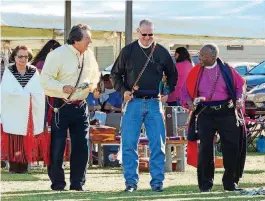  ?? [PHOTO BY NICOLE BAXLEY, EPISCOPAL DIOCESE OF OKLAHOMA] ?? Frank Oberly, a member of the Comanche-Osage Tribe, participat­es in the gourd dance with the Rt. Rev. Edward Konieczny, bishop of the Episcopal Diocese of Oklahoma, and the Most Rev. Michael Curry, presiding bishop of the Episcopal Church USA, at the...