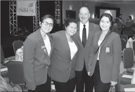  ?? LOANED PHOTOS/YUMA UNION HIGH SCHOOL DISTRICT ?? (FROM LEFT IN PHOTO ABOVE) ESMERALDA ALVARADO, Meilani Ruiz, Tim Lawrence, SkillsUSA executive director, and Leslie Lopez at the opening ceremony of the Washington Leadership Training Institute. Leslie Lopez, Meilani Ruiz, Esmeralda Alvarado, Jacob...