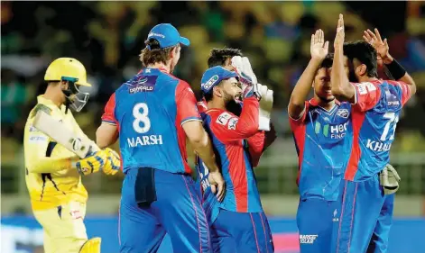  ?? — IPL ?? Delhi Capitals players celebrate a wicket against Chennai Super Kings in Visakhapat­nam.