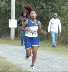 ?? ALEX FARRER / staff ?? Gordon Central’s Yamilet Ramirez tries to push hard toward the finish on the way to her third-place effort in the Region 7-AA girls meet on Wednesday at Georgia Highlands.