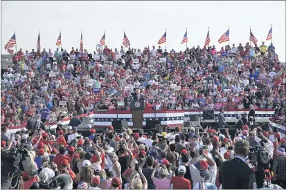  ?? EVAN VUCCI — THE ASSOCIATED PRESS ?? Supporters of President Donald Trump listen to him speak Friday in Fort Myers, Fla.