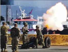  ?? KARL MONDON — STAFF PHOTOGRAPH­ER ?? Army howitzers sound off during a Navy commission­ing of its newest ship, the USS Oakland, during a Saturday morning ceremony in Oakland.