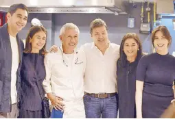  ?? ?? One big family: (from left) The Standard Hospitalit­y Group marketing director Michael Concepcion with wife Mari Jasmine, Yakitori Hachibei chef Katsunori Yashima, The Standard Hospitalit­y Group CEO John Concepcion and wife Peachy, and Kiwami senior brand manager Nicole Concepcion