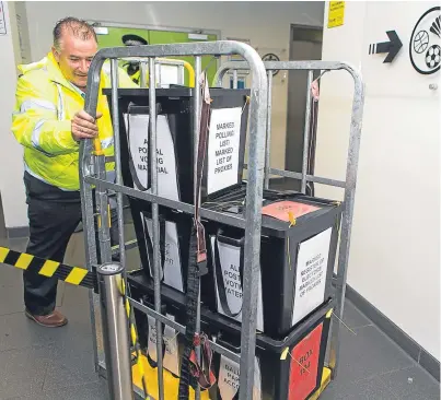  ?? Pictures: David Wardle. ?? Filled ballot boxes arrive at the Michael Woods Centre in Glenrothes.