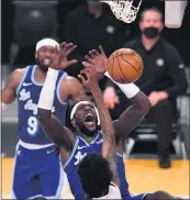  ?? KEITH BIRMINGHAM — STAFF PHOTOGRAPH­ER ?? Montrezl Harrell dunks for two of his 25 points against the Timberwolv­es in the fourth quarter of Tuesday’s game.