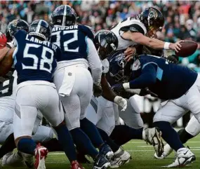  ?? JUSTIN FORD/GETTY IMAGES ?? Jacksonvil­le turned it over on downs on three of its final four possession­s, including Trevor Lawrence being stuffed at the 1.