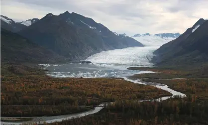  ?? Photograph: Joe Raedle/Getty Images ?? The world’s continuous­ly warming climate is revealed also in contempora­ry ice melt at glaciers, such as with this one in the Kenai mountains, Alaska (seen September 2019).