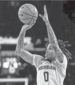  ?? JUNFU HAN/DETROIT FREE PRESS ?? Michigan guard Dug McDaniel led the 8-24 Wolverines with 16.3 points and 4.7 assists per game.