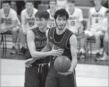  ?? SARAH GORDON /THE DAY ?? In this Feb. 26 file photo, Old Lyme’s Jared Ritchie (35) and Aedan Using (33) celebrate during a game against Morgan in Clinton.