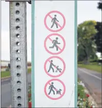  ?? MAUREEN COULTER/THE GUARDIAN ?? The City of Charlottet­own has these signs posted on either end of the cycling lane at Victoria Park. The sign states that walking, running, pushing strollers and walking dogs are prohibited.