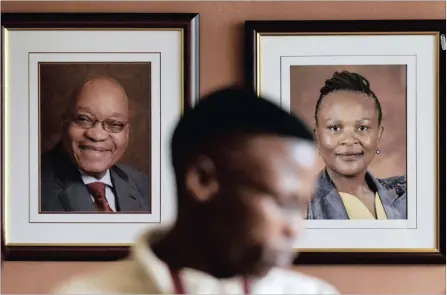  ?? PICTURE: PHILL MAGAKOE ?? CHANGES EXPECTED: A portrait of the new public protector advocate Busisiwe Mkhwebane is mounted next to one of President Jacob Zuma at her office in Pretoria. Mkhwebane said one of the challenges in her new job was the low staff morale in the office.