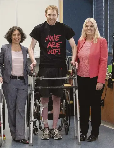  ??  ?? ABOVE: (From left) Dr Claudia Angeli, Jeff Marquis and Prof Susan Harkema at the Kentucky Spinal Cord Injury Research Center