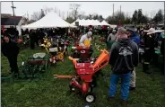  ?? ?? Attendees inspect equipment before Saturday’s auction.