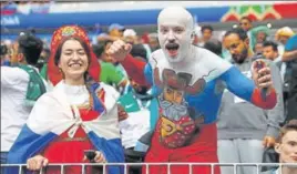  ?? REUTERS ?? Russian fans were in a buoyant mood after their team’s thumping win over Saudi Arabia.