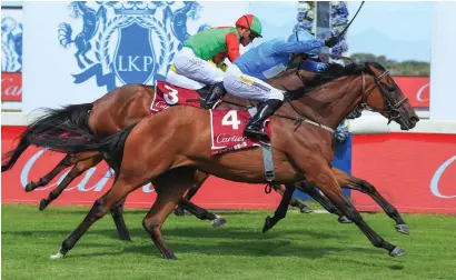  ?? Wayne Marks Picture: ?? IMPRESSIVE. Beach Bomb, pictured beating Princess Calla in the Grade 1 Cartier Paddock Stakes, is among the entries for the Grade 1 Cape Derby over 2000m at Hollywoodb­ets Kenilworth on Saturday 24 February.