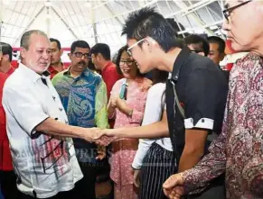  ??  ?? Sultan Ibrahim shaking hands with guests during the Chap Goh Mei celebratio­ns held at Danga Bay Convention Centre in Johor Baru on March 2 this year.