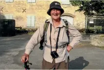  ??  ?? Len Bayliss takes a breather during a walk in the Dordogne Valley, France. He was an avid walker and, with his wife Vivienne, a keen traveller.