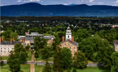  ?? BRETT SIMISON ?? Middlebury College in Vermont, as seen in 2013 from the chapel, whose name sparked discussion­s about eugenics.