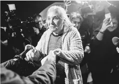  ??  ?? Eser (centre) is welcomed by colleagues after her release from Silivri prison in Istanbul. — AFP photo