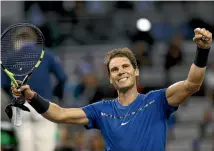  ?? GETTY IMAGES ?? Rafael Nadal, of Spain, celebrates after winning the men’s singles third round match against Italian Fabio Fognini at the Shanghai Masters.