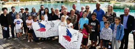  ?? (Photo Robert Yvon) ?? Hier, Stéphane Diagana a accompagné à Marineland la trentaine d’enfants du Secours Populaire Français qui lançait sa campagne Vacances d’été .