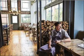  ?? PHOTOS BY SHAWN POYNTER/THE NEW YORK TIMES ?? Joseph Lenn named his restaurant J.C. Holdway for his great-uncle. Lenn said his menu embraces internatio­nal flavors, which were implicitly forbidden at Blackberry Farm.