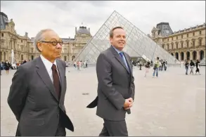  ?? Eric Feferberg / AFP/Getty Images ?? In this 2006 file photo, Chinese architect of the Louvre Pyramid Ieoh Ming Pei, left, and the French Culture Minister Renaud Donnedieu de Vabres walk in the Napoleon courtyard of the Louvre museum in Paris.