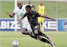  ?? | BackpagePi­x ?? TERCIOUS Malepe of AmaZulu challenges Kabelo Mahlasela of Royal AM DStv Premiershi­p draw at Chatsworth Stadium yesterday. during their 0-0