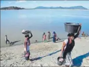  ?? AP FILE ?? n Women wash clothes in the Brahmaputr­a in Guwahati.