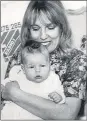  ??  ?? Rebecca in mum Esther’s arms in 1980